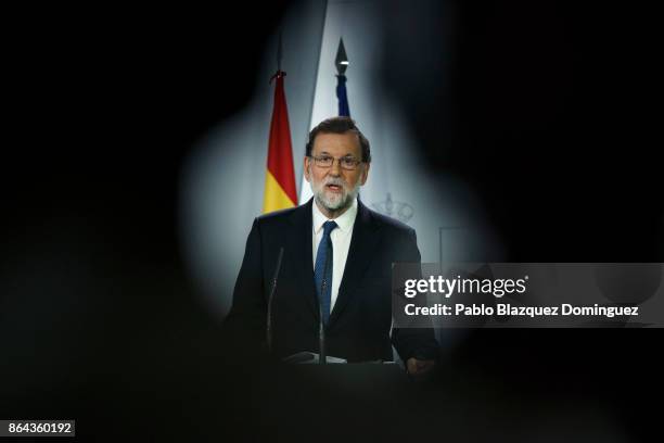 Spanish Prime Minister Mariano Rajoy speaks during a press conference after an extraordinary cabinet meeting at Moncloa Palace on October 21, 2017 in...