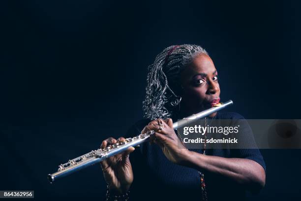 beautiful music - flautist stock pictures, royalty-free photos & images