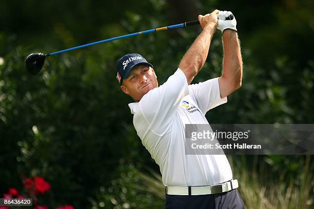 John Rollins hits a tee shot during a practice round prior to the start of THE PLAYERS Championship on THE PLAYERS Stadium Course at TPC Sawgrass on...
