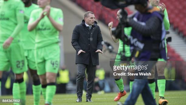 Manager of Celtic Brendan Rodgers talks to Scott Brown at the end of the Betfred Cup Semi-Final at Hampden Park on October 21, 2017 in Glasgow,...
