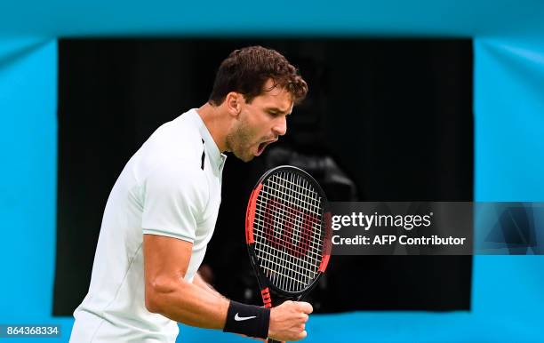 Bulgaria's Grigor Dimitrov reacts during the semi final match against Italy's Fabio Fognini of the ATP Stockholm Open tennis tournament in Stockholm...