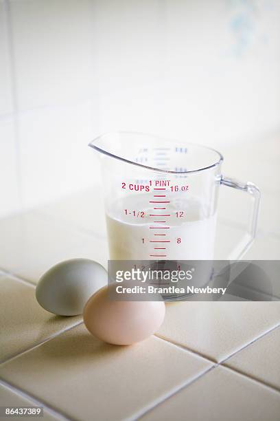 eggs and pitcher of milk - milk pitcher ストックフォトと画像