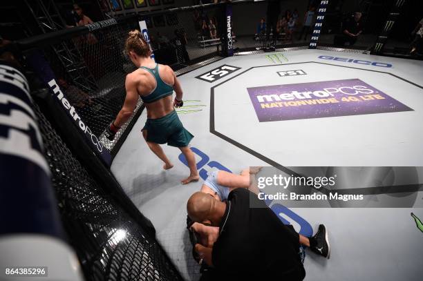 Barb Honchak celebrates her victory over Gillian Robertson during the filming of The Ultimate Fighter: A New World Champion at the UFC TUF Gym on...