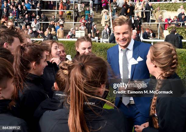 Chris Hughes meets students from the British Racing School during the QIPCO British Champions Day at Ascot Racecourse on October 21, 2017 in Ascot,...