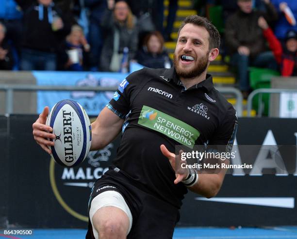 Tommy Seymour of Glasgow Warriors celebrates scoring a try in the second half during the European Rugby Champions Cup match between Glasgow Warriors...