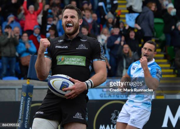 Tommy Seymour of Glasgow Warriors celebrates scoring a try in the second half during the European Rugby Champions Cup match between Glasgow Warriors...