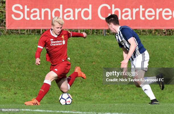 Luis Longstaff of Liverpool and George Harmon of West Bromwich Albion in action during the Liverpool v West Bromwich Albion U18 Premier League game...