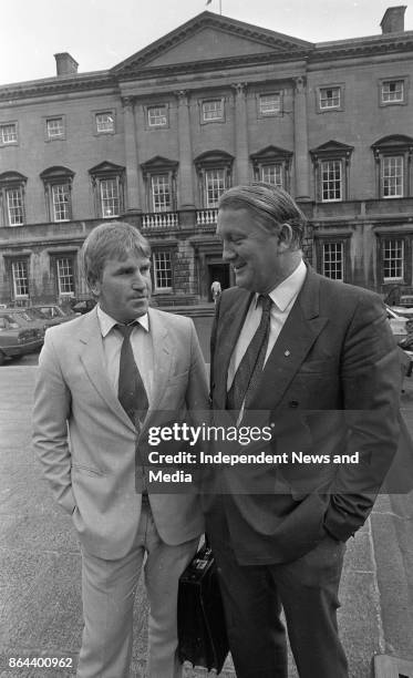 Senator Jimmy Deenihan, FG, and Senator Michael Langan arriving at Leinster House for the Senate Meeting, October 1, 1986. .