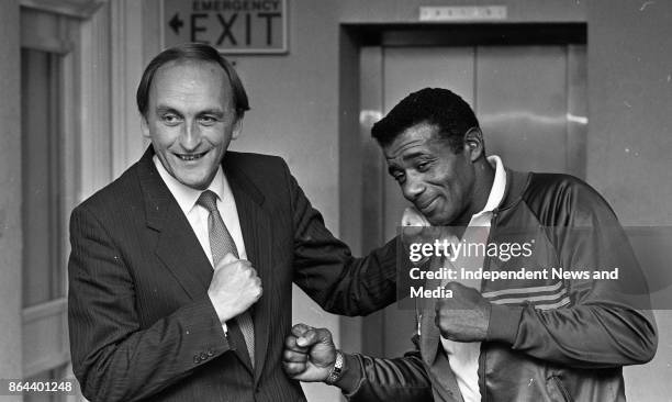 Former World Boxing Champion Floyd Patterson meeting the Minister for Sport Sean Barrett at Government Buildings, October 8, 1986. .