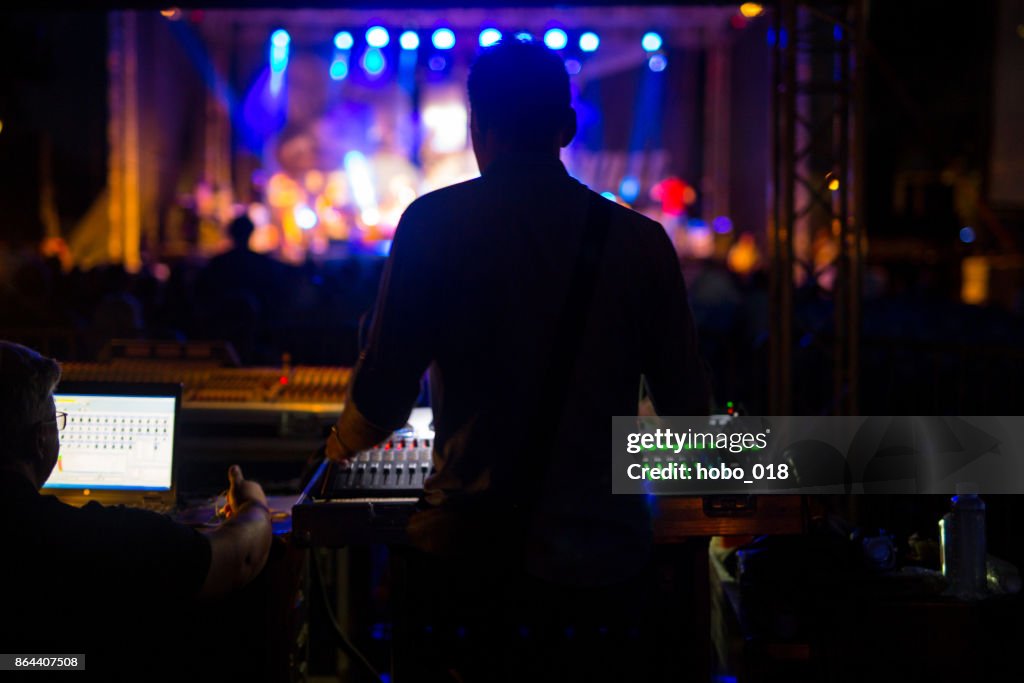 Sound technician at music festival