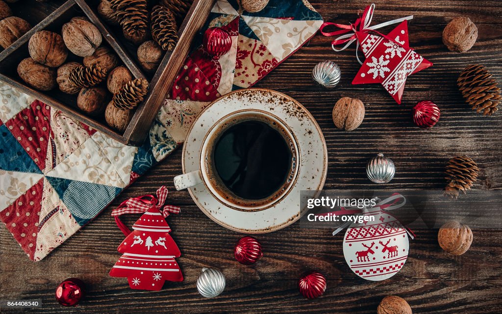 Christmas Decor with Cup of Coffee on Dark Wooden Background