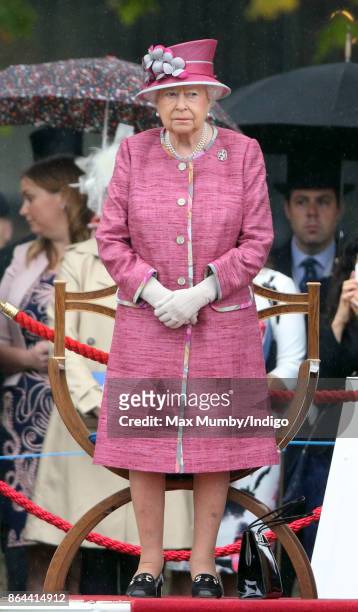 Queen Elizabeth II reviews the King's Troop Royal Horse Artillery during their 70th anniversary parade in Hyde Park on October 19, 2017 in London,...