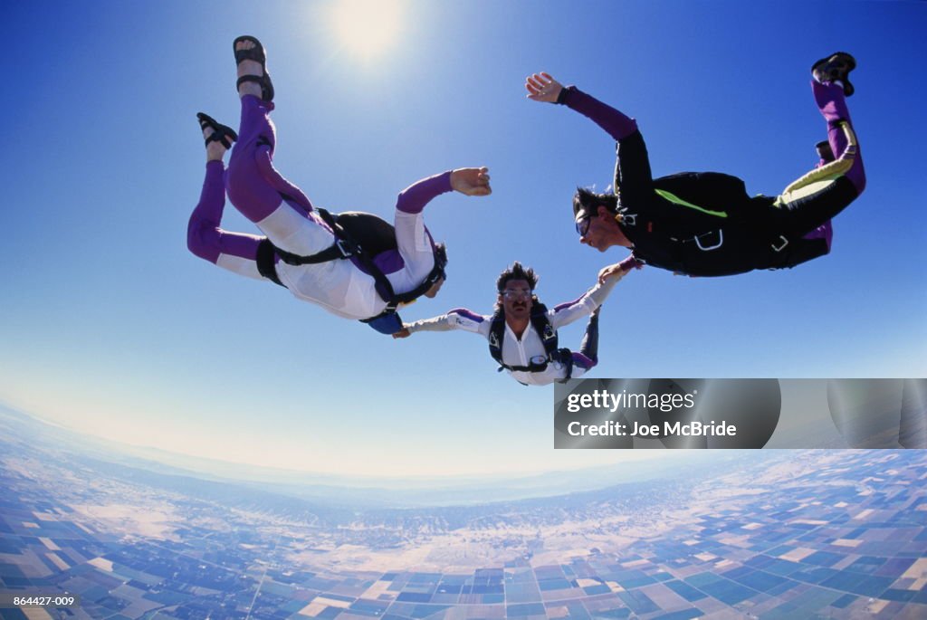 Skydivers Skydivers Linked In Free Fall Formation Low Angle View 1995 High-Res ...