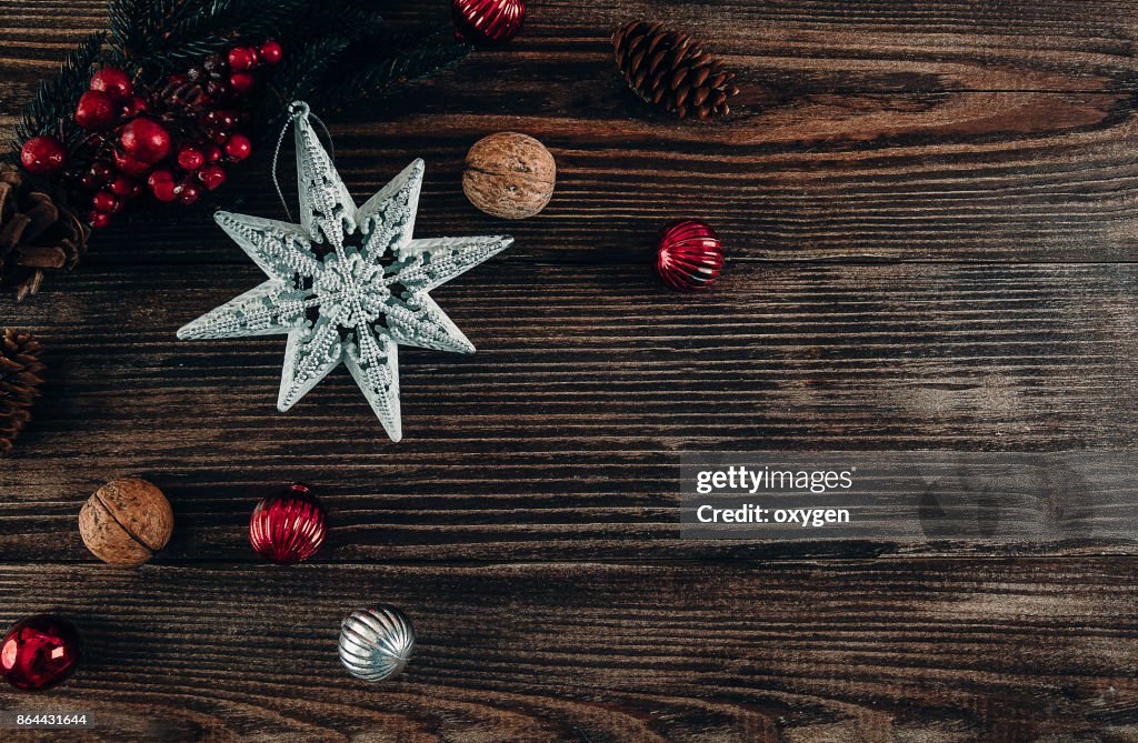 Christmas Decoration Star on Dark Wooden Background