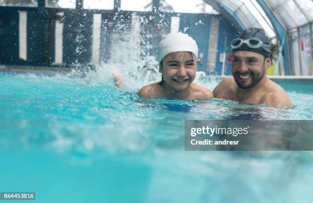 happy boy taking swimming lessons - kids clubhouse stock pictures, royalty-free photos & images