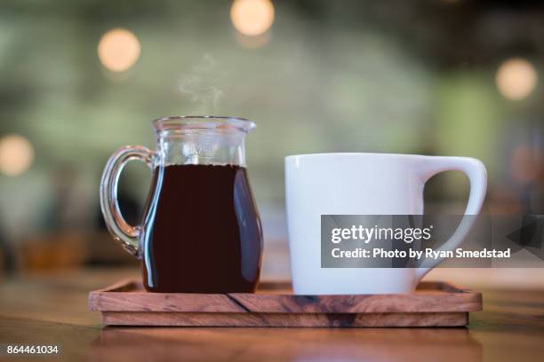 artisanal coffee at a coffee shop - artisan coffee shop stock pictures, royalty-free photos & images