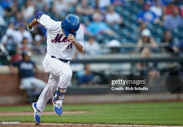 Norichika Aoki of the New York Mets grounds out to third in the sixth inning of the first game of a double header against the Atlanta Braves at Citi...