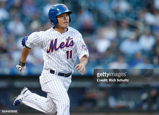 Norichika Aoki of the New York Mets grounds out to third in the sixth inning of the first game of a double header against the Atlanta Braves at Citi...