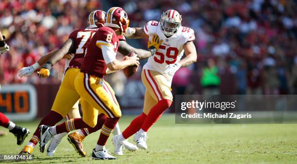 Aaron Lynch of the San Francisco 49ers rushes the quarterback during the game against the Washington Redskins at FedEx Field on October 15, 2017 in...