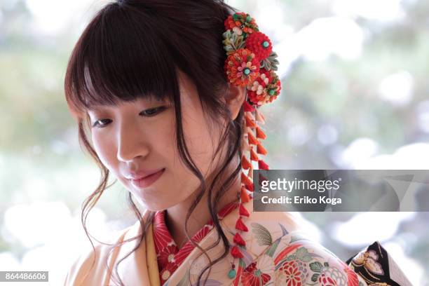 profile of young woman of coming‐of‐age ceremony - seijin no hi fotografías e imágenes de stock