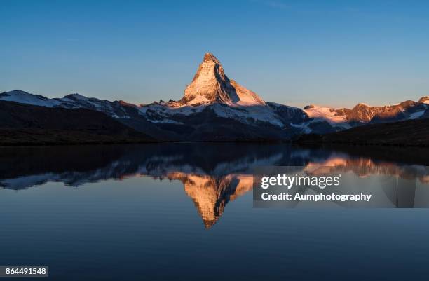 matterhorn reflection in lake stellisee - zermatt switzerland stock pictures, royalty-free photos & images