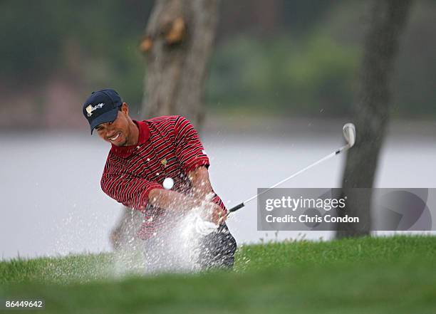 Tiger Woods of the U.S. Team during the four-ball matches in the third round of The Presidents Cup at Robert Trent Jones Golf Club in Prince William...