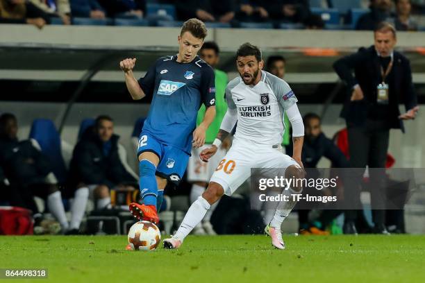 Dennis Geiger of Hoffenheim and Junior Caicara of Istanbul Basaksehir battle for the ball during the UEFA Europa League Group C match between 1899...