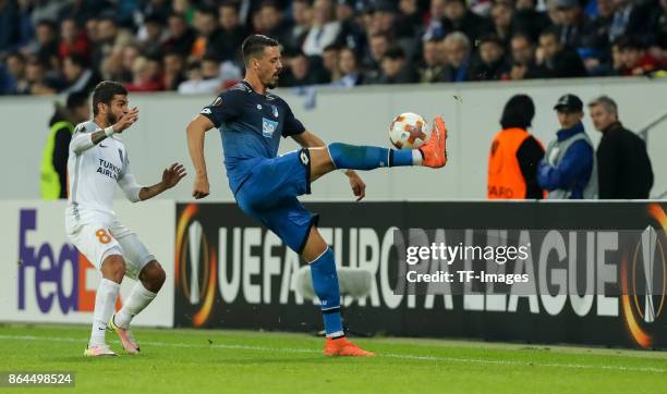 Junior Caicara of Istanbul Basaksehir and Sandro Wagner of Hoffenheim battle for the ball during the UEFA Europa League Group C match between 1899...