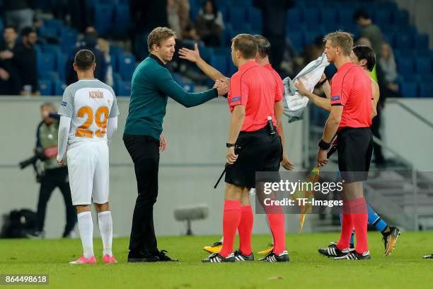 Head coach Julian Nagelsmann of Hoffenheim shakes hands with the referee during the UEFA Europa League Group C match between 1899 Hoffenheim and...