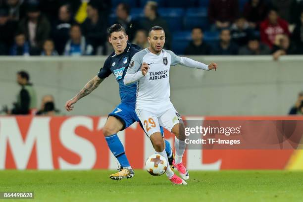 Kerim Frei of Istanbul Basaksehir and Steven Zuber of Hoffenheim battle for the ball during the UEFA Europa League Group C match between 1899...