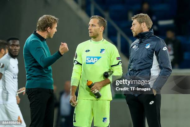 Head coach Julian Nagelsmann of Hoffenheim speak with Goalkeeper Oliver Baumann of Hoffenheim during the UEFA Europa League Group C match between...