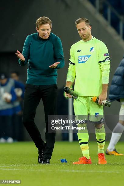 Head coach Julian Nagelsmann of Hoffenheim speak with Goalkeeper Oliver Baumann of Hoffenheim during the UEFA Europa League Group C match between...