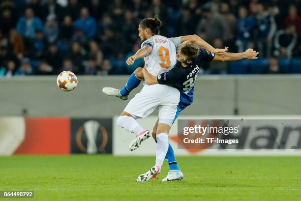 Mehmet Batdal of Istanbul Basaksehir and Stefan Posch of Hoffenheim battle for the ball during the UEFA Europa League Group C match between 1899...