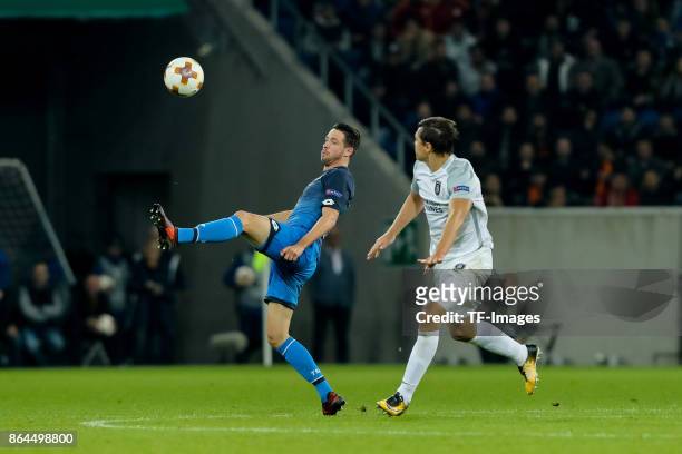 Mark Uth of Hoffenheim and Alexandru Epureanu of Istanbul Basaksehir battle for the ball during the UEFA Europa League Group C match between 1899...