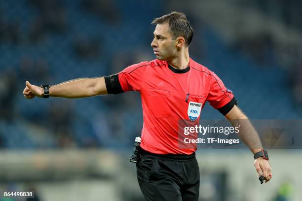 Referee Aleksei Eskov gestures during the UEFA Europa League Group C match between 1899 Hoffenheim and Istanbul Basaksehir F.K at Wirsol...