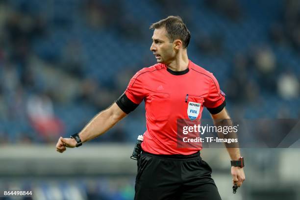 Referee Aleksei Eskov gestures during the UEFA Europa League Group C match between 1899 Hoffenheim and Istanbul Basaksehir F.K at Wirsol...