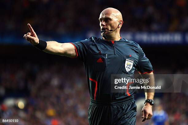 Referee Tom Henning Ovrebo makes a decision during the UEFA Champions League Semi Final Second Leg match between Chelsea and Barcelona at Stamford...