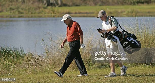 Arnold Palmer competes in the first round of the MBNA Father/Son Challenge at ChampionsGate golf course, ChampionsGate, FL Saturday, December 3 2005