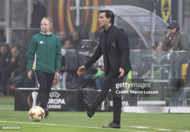 Milan coach Vincenzo Montella kicks a ball during the UEFA Europa League group D match between AC Milan and AEK Athens at Stadio Giuseppe Meazza on...