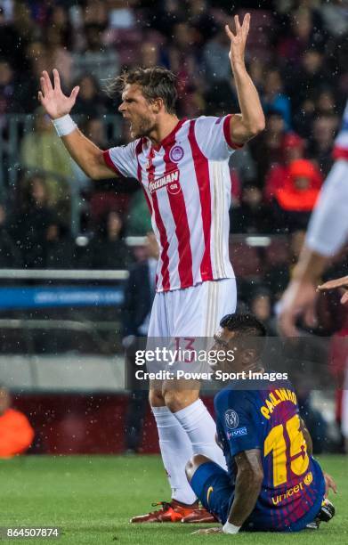 Guillaume Gillet of Olympiacos FC reacts during the UEFA Champions League 2017-18 match between FC Barcelona and Olympiacos FC at Camp Nou on 18...