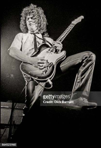 Myles Goodwyn of April Wine performs on stage in London, 1976.