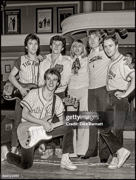 Group portrait of Slik on stage at the White Elephant Club, London, 1976. Jim McGinlay back left, Midge Ure front, Kenny Hyslop back second left,...