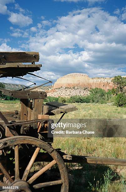 rustic old wagon in ghost ranch, new mexico - ghost ranch stock pictures, royalty-free photos & images