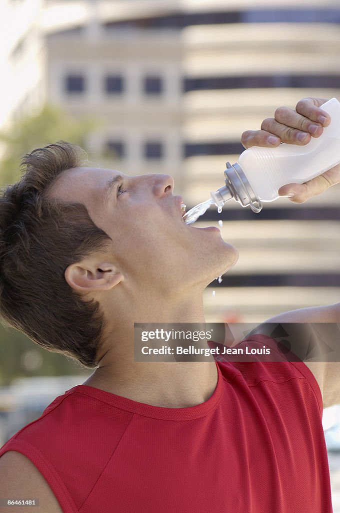 Man drinking bottled water