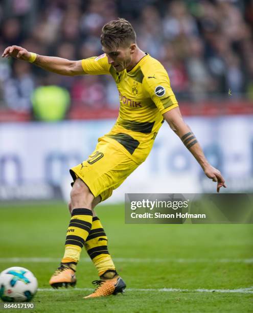 Maximilian Philipp of Dortmund scores his team's second goal during the Bundesliga match between Eintracht Frankfurt and Borussia Dortmund at...