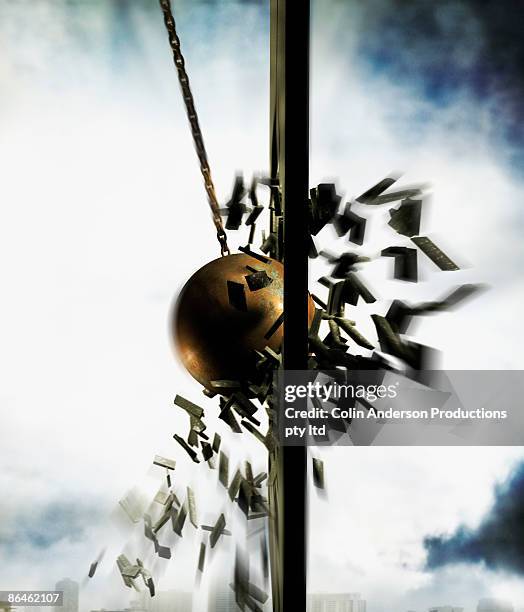 wrecking ball hitting wall - wrecking ball stock pictures, royalty-free photos & images