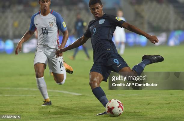 Rhian Brewster of England scores the first goal during the quarterfinal football match between USA and England in the FIFA U-17 World Cup at the...
