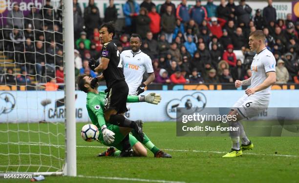 Shinji Okazaki of Leicester City scores the 2nd Leicester goal during the Premier League match between Swansea City and Leicester City at Liberty...