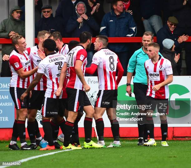 Cheltenham Town's Danny Wright celebrates scoring the opening goal during the Sky Bet League Two match between Cheltenham Town and Lincoln City at...