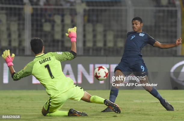 Rhian Brewster of England shoots past Justin Garces of USA to score the second goal during the quarterfinal football match between USA and England in...